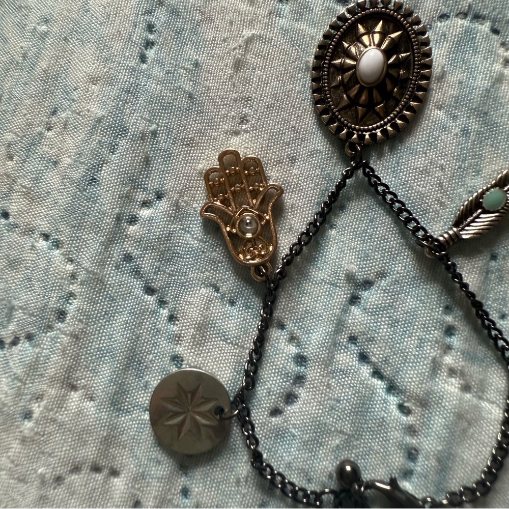 Elegant Multi-Charm Bracelet in Black and Gold - Picture 3 of 9